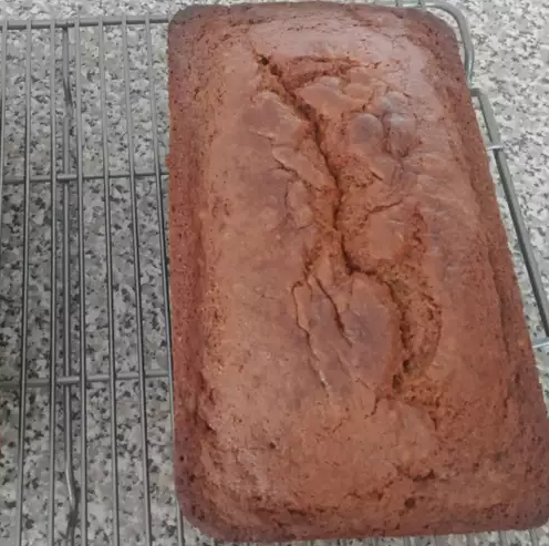 Deliciously moist Pumpkin Banana Loaf with a golden brown crust.