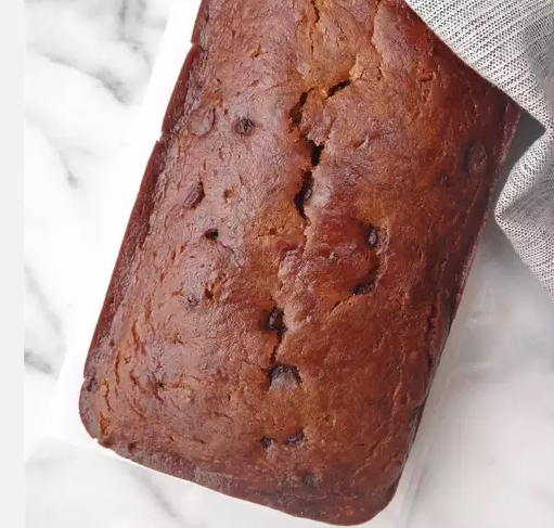 Deliciously moist Pumpkin Banana Loaf with a golden brown crust.