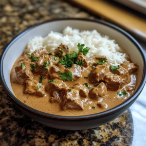 Beef Stroganoff served with creamy sauce and noodles.